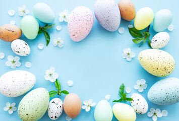 Colorful Easter eggs with spring blossom flowers