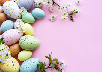 Colorful Easter eggs with spring blossom flowers