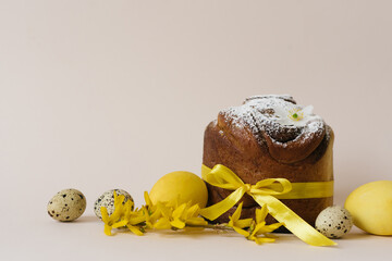 Easter cakes (Orthodox Easter cake), eggs and forsythia branches. The scene of the Easter holiday....