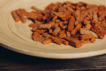 salty croutons snacks delicacy meal wooden table