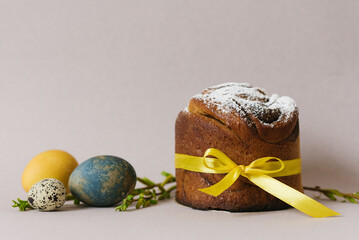 Easter cakes (Orthodox Easter cake), eggs and forsythia branches. The scene of the Easter holiday....