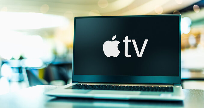 Laptop computer displaying logo of Apple TV
