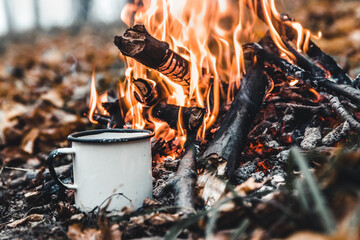 Making coffee at the stake. Make coffee or tea on the fire of nature. Burned fire. A place for fire. - 418676895