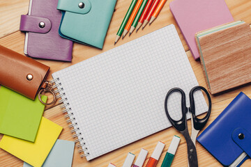 multicolored pencils work desk stationery notepad close up