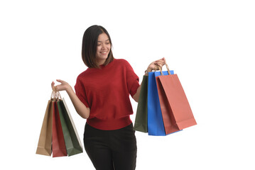 Young Asian women is shopping happily, on a white background.