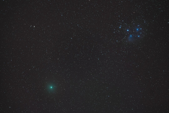 Comet Atlas Meets The Pleiades In The Deep Sky At Night