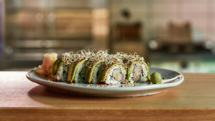 Sushi with rice and fish standing on a plate