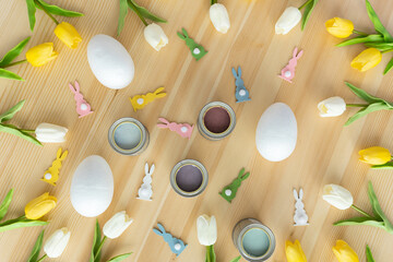happy easter eggs on wooden table pastel colors concept traditional colorful background concept...