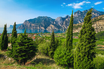 Lake Garda and Torbole resort view from the hill, Italy - obrazy, fototapety, plakaty