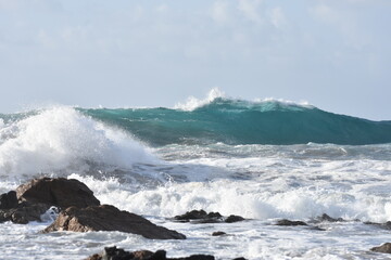 Watching the waves from the cliff