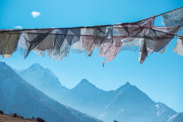 Old Buddhist prayer flags in the Himalayan Mountains