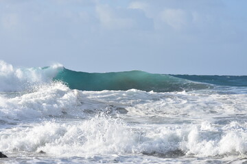 Watching the waves from the cliff