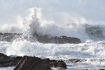 Watching the waves from the cliff