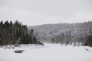 Snow covered river  Gauja in Sigulda city , Latvia