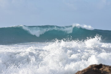 Watching the waves from the cliff