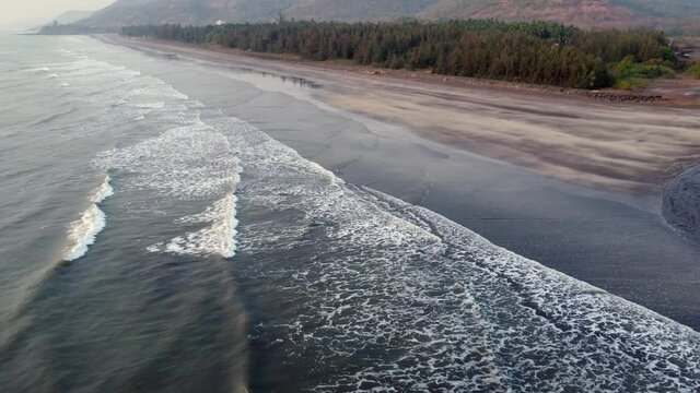 Aerial footage of Ladghar beach at Dapoli, located 200 kms from Pune on the West Coast of Maharashtra India.