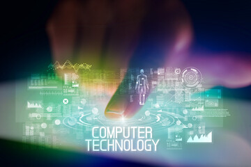 Finger touching tablet with web technology icons and COMPUTER TECHNOLOGY inscription
