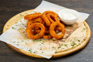 deep-fried onion rings in breading. beer snack
