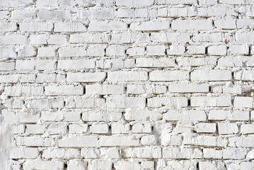 The texture of an old white brick wall. Close-up, pattern.