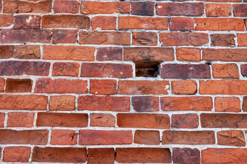 Obraz premium The texture of an old red brick wall. Close-up, pattern.