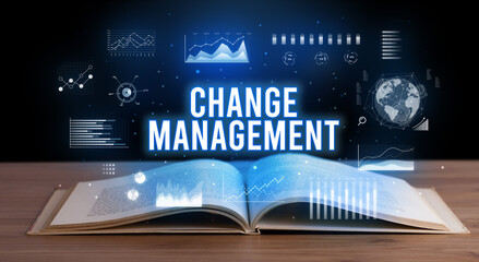 CHANGE MANAGEMENT inscription coming out from an open book, creative business concept