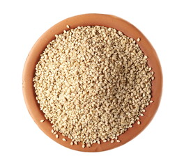 Organic integral sesame seeds in clay pot isolated on white background, top view