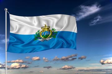 San Marino national flag waving in the wind against deep blue sky.  International relations concept.