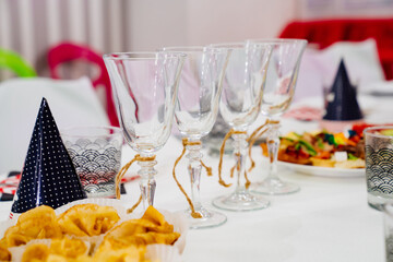 empty glasses on a table served for the children's holiday. 