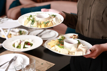 waiter serving food
