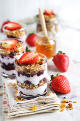 Dessert of homemade muesli, berries and yogurt