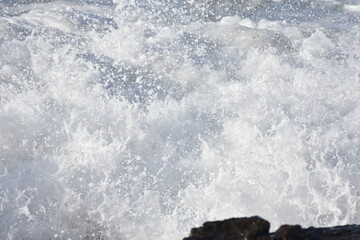 Watching the waves from the cliff