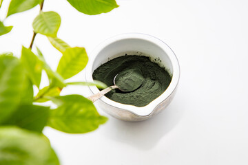 spirulina powder in bowl superfood