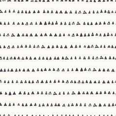 Obraz premium Hand drawn ink doodle naive style seamless pattern with black triangles