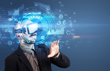 Obraz premium Businessman looking through Virtual Reality glasses with ASP.NET inscription, innovative technology concept