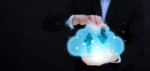 Business holding cloud networking concept and touch screen with hand connection line on the black...