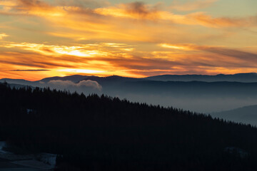 Fototapeta na wymiar Sunrise on Mount Koskowa with view of the Tatras and the Polish beskid mountains. Colorful sky, golden hour