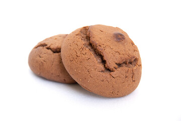 Cookies close-up on a white background. Sweet pastries. Round oatmeal chocolate chip cookies close-up.