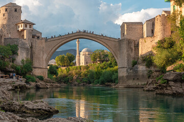 Fototapeta na wymiar Old bridge or Stari most in medieval town Mostar in Bosnia and Herzegovina on sunset, Balkans, Europe