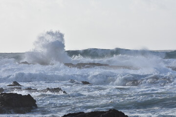 Watching the waves from the cliff