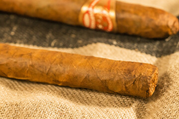 cuban cigar on wooden background