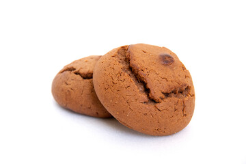 Round oatmeal chocolate chip cookies close-up. Cookies close-up on a white background. Sweet pastries.