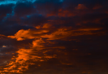 Fototapeta na wymiar Beautiful sunset. Orange clouds in the sky (background)