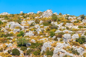 Lycian tombs below turkish Simena fortress near Kekova island in Antalya province, Turkey