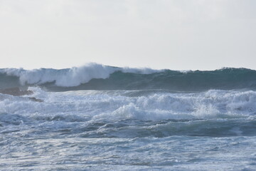 Watching the waves from the cliff