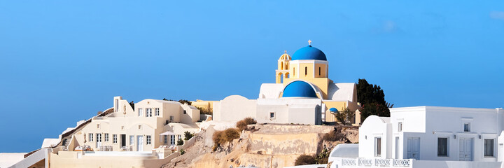 Fototapeta premium St George Church in Oia village on Santorini island, Greece