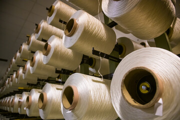Rolls of white thread