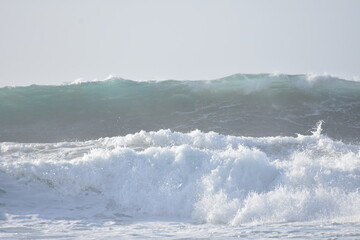 Watching the waves from the cliff