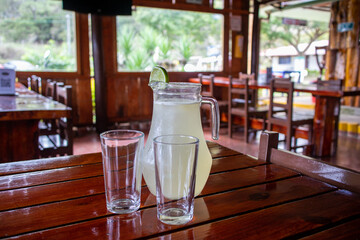 lemonade jar and two glasses