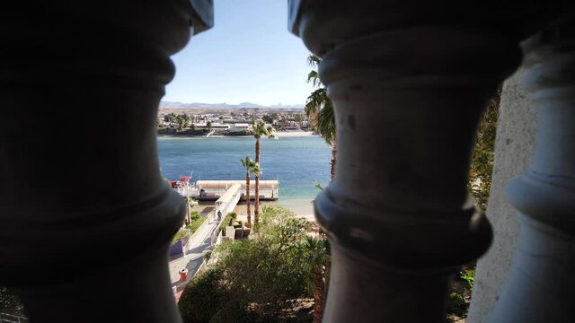 Colorado River View From Terrace of Luxury Casino and Hotel in Laughlin, Nevada USA on Sunny Day, Slow Motion