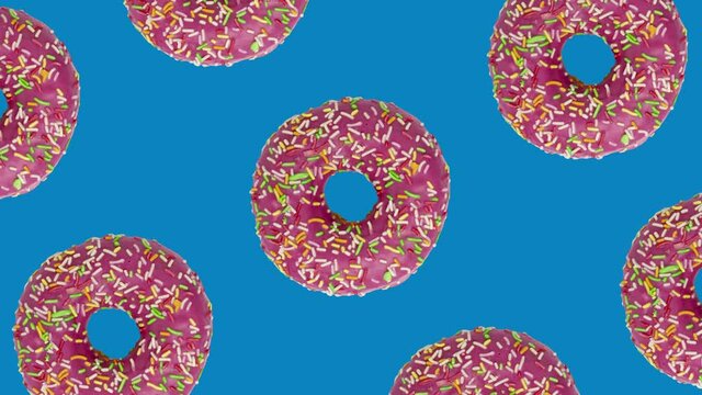 Pink donuts in geometric pattern on a blue background. Simple motion graphics food concept animation